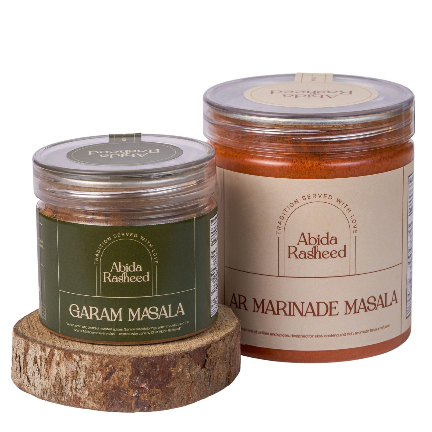 Two jars of Abida Rasheed spices on a white background