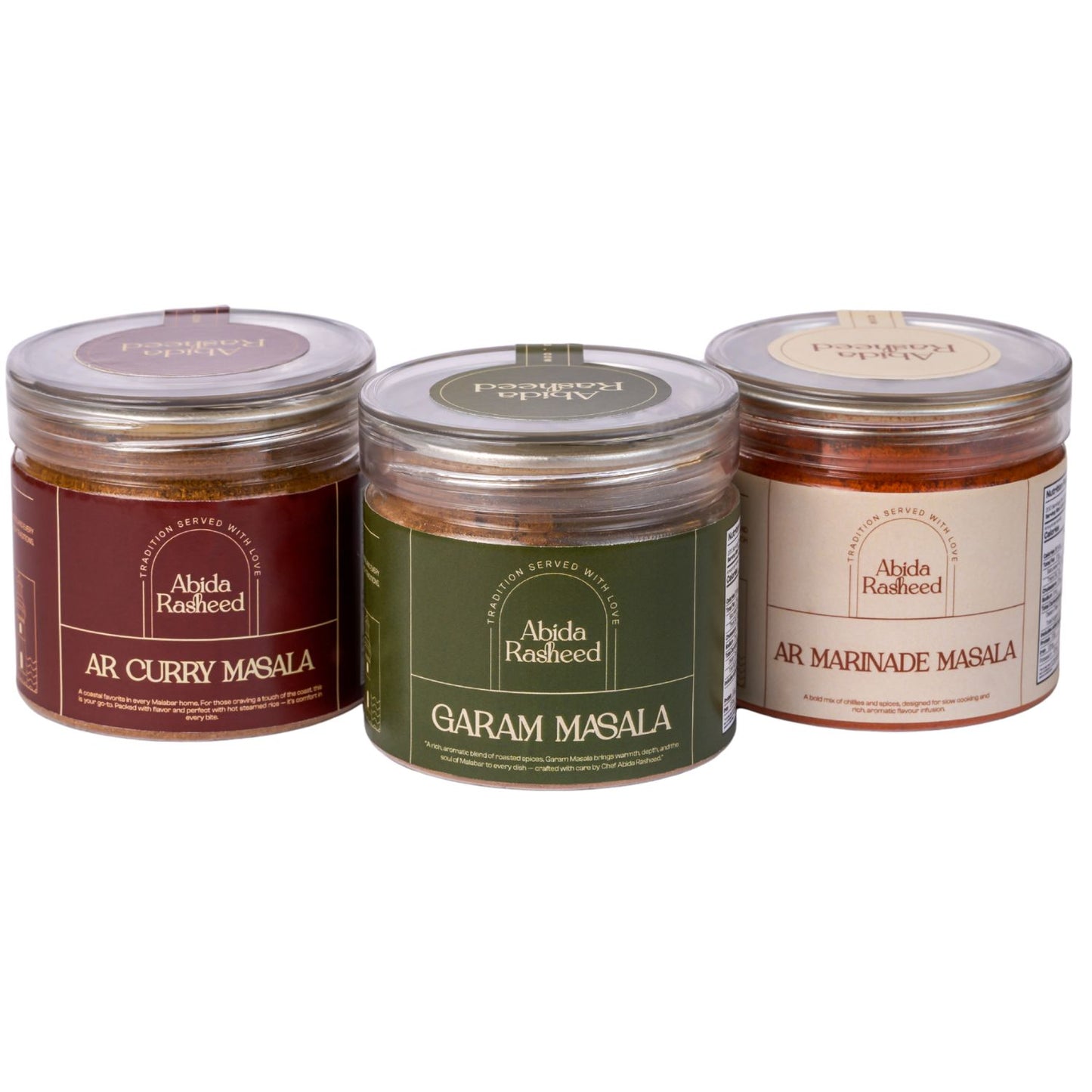 Three jars of Ahida Rashheed spices on a white background