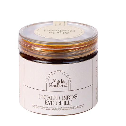 Jar of Abida Rasheed Pickled Bird's Eye Chilli on a white background